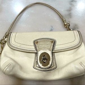 Coach Wristlet - Gold with a Pink Lining